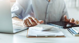 Accountant using a calculator