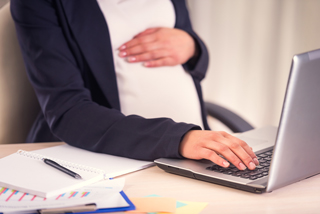 Pregnant Business Woman at Laptop