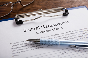 Photo of Papers with Sexual Harassment Forms